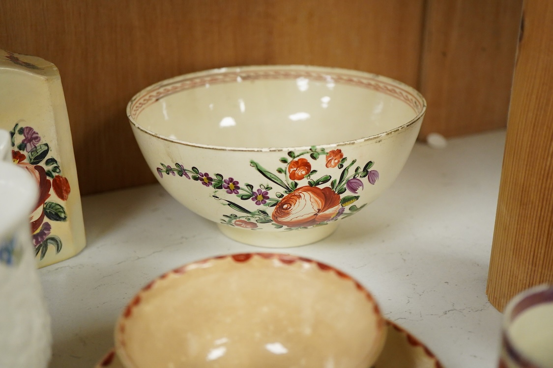 A group of late 18th century cream ware including a tea caddy a slops bowl, a tea bowl and saucer etc. and various 19th-century porcelain and pottery, blue and white tea caddy, 12cm high.
